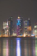 Doha skyline by night, in Qatar
