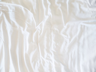 Top view of bedding sheets crease, White Wrinkled Fabric Texture for back ground
