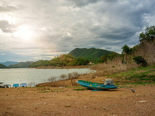 The boat on the lake side, Alone boat on lake side under sunset light