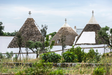 Trulli of the Itria valley. Details in the sky. Puglia, Italy.