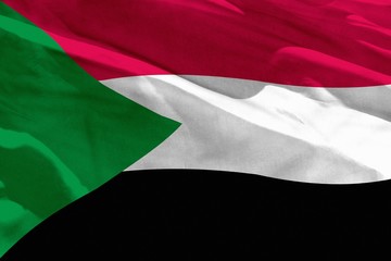 Waving Sudan flag for using as texture or background, the flag is fluttering on the wind