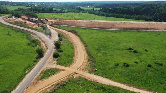 Aerial view on the construction of a new highway in the countryside