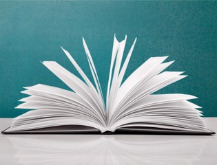 Books collection on dark background with copy