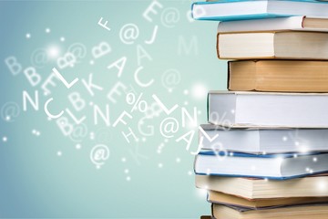 Books collection in pile on  background.