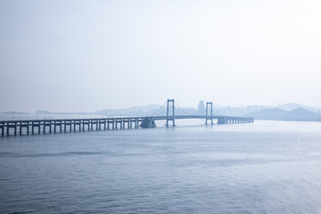 Fototapeta premium Bridge across the sea in Dalian, China