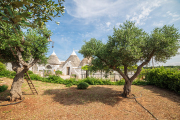 Trulli of the Itria valley. Details in the sky. Puglia, Italy.
