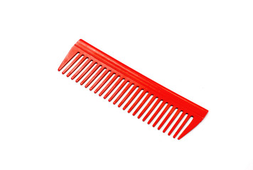 red plastic hairbrush