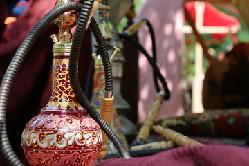 Hookahs on a eastern market. Stylish oriental shisha in arabian interior