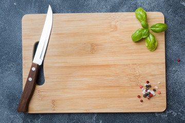 empty wooden cutting board on kitchen table. Top view copy space