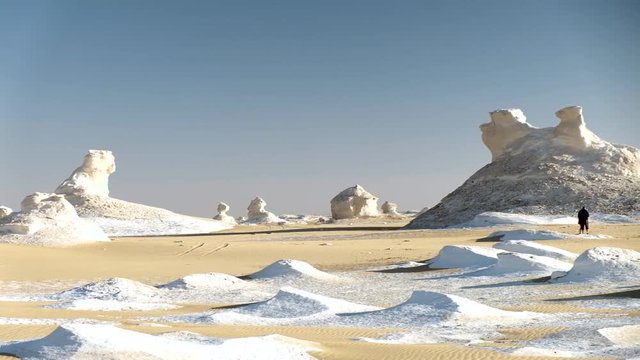 The White Desert & Black Desert in Egypt. People exploring together in the desert