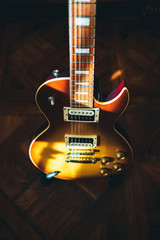 Top view of brown electric guitar