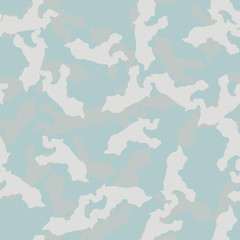 Winter camouflage of various shades of grey, blue and white colors