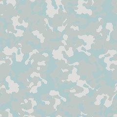 Winter camouflage of various shades of grey, blue and white colors