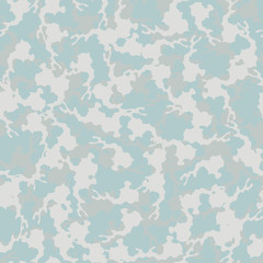 Winter camouflage of various shades of grey, blue and white colors