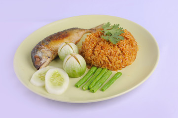 fried rice with chili shrimp source and fried mackarel on white background