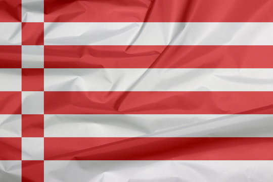 Fabric flag of Bremen, a red and white flag.