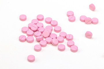 Pink Vitamins B1 Pills isolated on White Background. 