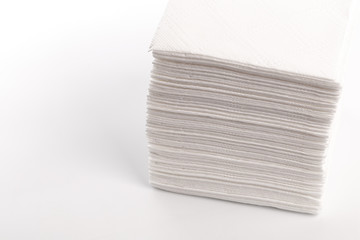 a stack of napkins  on white background .