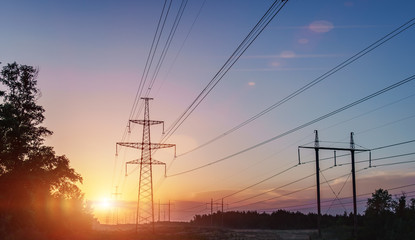 Fototapeta na wymiar High-voltage power lines. Electricity distribution station. high voltage electric transmission tower. Distribution electric substation with power lines and transformers