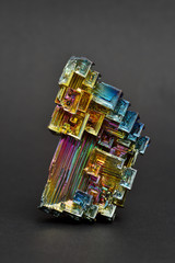 Bismuth crystals on a dark background. This is the most strongly diamagnetic element and also the heaviest that is not radioactive.