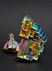 Bismuth crystals on a dark background. This is the most strongly diamagnetic element and also the heaviest that is not radioactive.