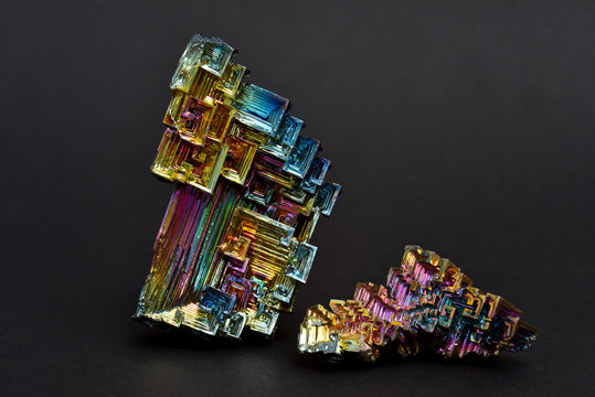 Bismuth crystals on a dark background. This is the most strongly diamagnetic element and also the heaviest that is not radioactive.