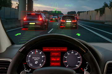 view from the cockpit of a car equipped with HUD and active safety systems.The systems detected a...