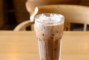 Cold chocolate on a wooden table