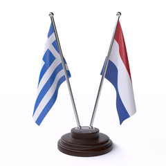 Greece and Netherlands, two table flags isolated on white background. 3d image