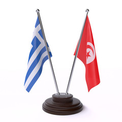 Greece and Tunisia, two table flags isolated on white background. 3d image