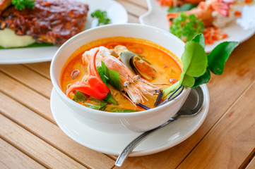 Tom Yum Kung spicy soup with prawn, shell and herb