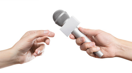 Hand giving a microphone, isolated on white background