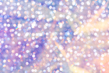 Modern beautiful holographic background of holiday lights bokeh. Trendy 80's style. Wallpaper...