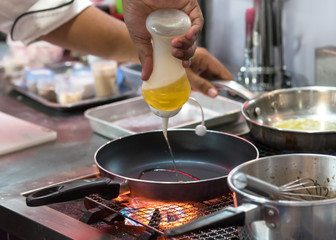 Chef cooking food in the kitchen, Chef preparing food