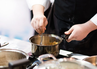Chef cooking food in the kitchen, Chef preparing food