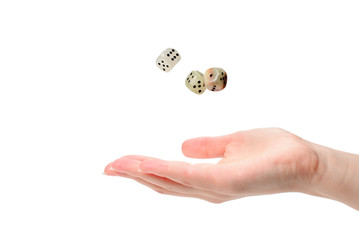 Woman throws dices isolated on white.