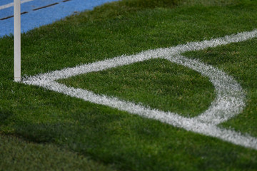 Corner kick football / soccer field outline on green grass