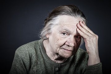 Portrait of elderly woman. Thoughtfulness. Toned