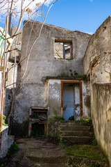 Abandoned house. A glimpse of ghost town Alianello. Matera province, Italy