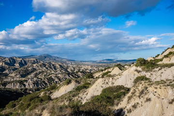 Fototapeta na wymiar Badlands called calanchi. Landscape of Basilicata region. Matera province, Italy