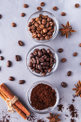 Different types of coffee beans in a bowl. Top view. Closeup