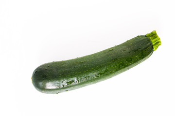 Healthy food concept organic green Zucchini or courgette isolated on white background