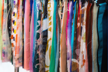 Fabric and textiles samples in a factory shop or store. Differen