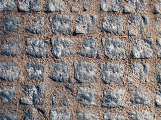 Paving blocks with dirt texture.