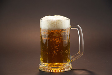Bright, cold beer in a glass of glass
