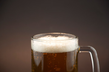 Bright, cold beer in a glass of glass