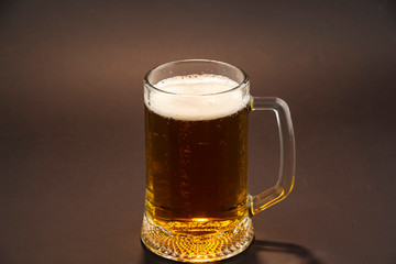 Bright, cold beer in a glass of glass