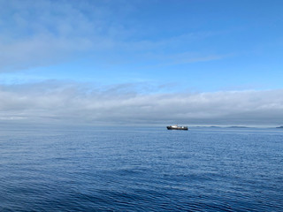 Ussuriysky Bay of Japanese sea in cloudy summer day. Russia, Vladivostok