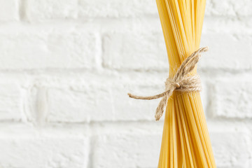 Close-up of spaghetti tied with a rope
