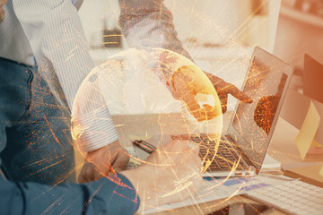 Social network theme hologram with businessman working on computer on background. Multi exposure.